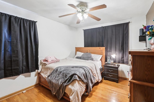 109 County Park Rd, Waupun, WI 53963 - bedroom featuring light wood-style flooring, ceiling fan, and baseboards