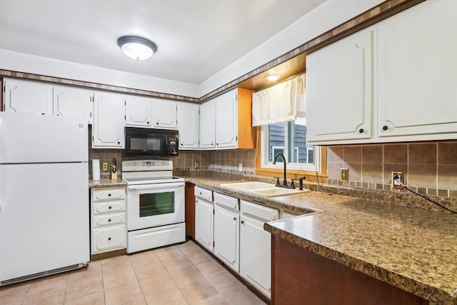 109 County Park Rd, Waupun, WI 53963 - kitchen with white appliances, a sink, backsplash, white cabinetry, and light tile patterned flooring