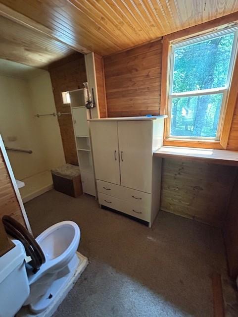 N6812 Eddy Rd, Black River Falls, WI 54615 - full bath with a walk in shower, wooden ceiling, toilet, and wooden walls