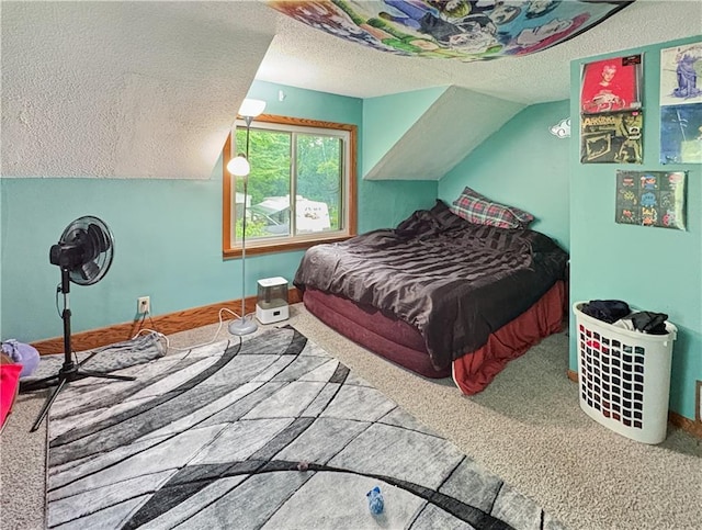 711 Cleveland Ave, Ladysmith, WI 54848 - carpeted bedroom featuring a textured ceiling and vaulted ceiling