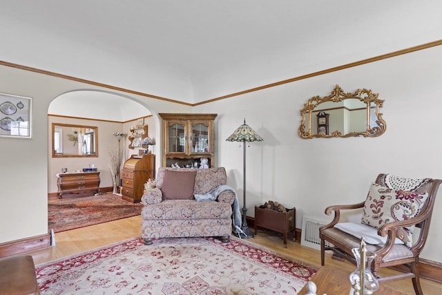 11203 W Potter Rd, Wauwatosa, WI 53226 - living area with wood finished floors and arched walkways