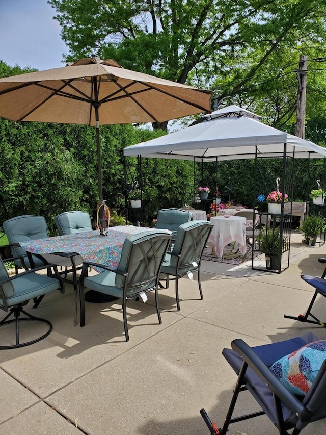 11203 W Potter Rd, Wauwatosa, WI 53226 - view of patio / terrace featuring outdoor dining area
