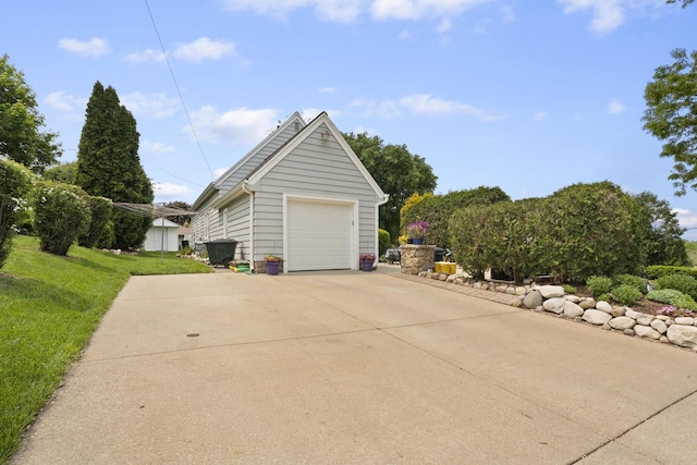 11203 W Potter Rd, Wauwatosa, WI 53226 - garage with concrete driveway