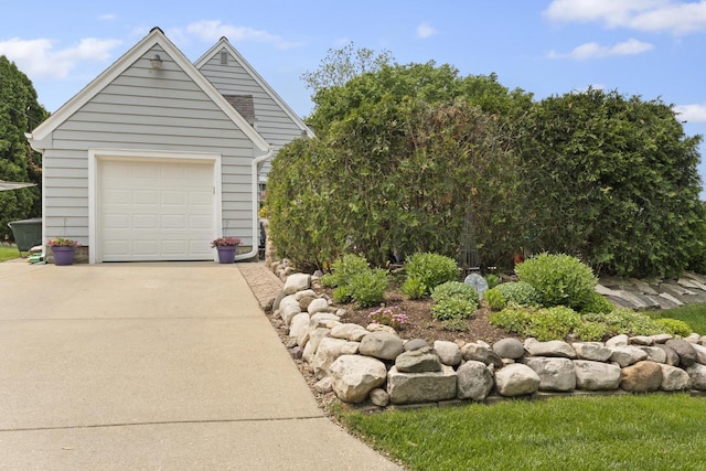 11203 W Potter Rd, Wauwatosa, WI 53226 - garage with concrete driveway