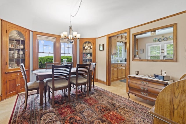 11203 W Potter Rd, Wauwatosa, WI 53226 - dining area with a chandelier