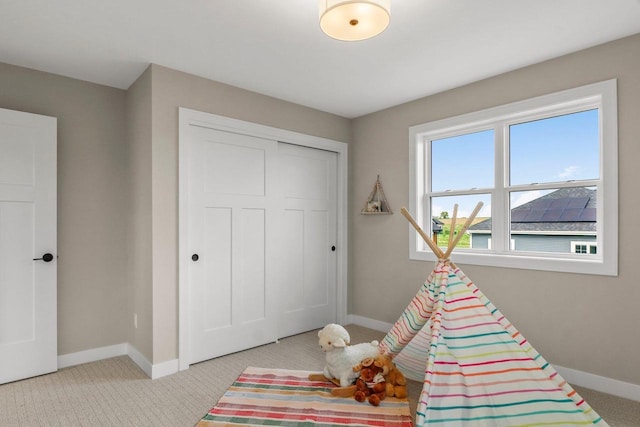 6562 Norski Ct, Windsor, WI 53598 - carpeted bedroom with baseboards and a closet