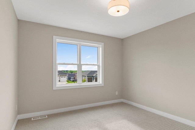 6562 Norski Ct, Windsor, WI 53598 - carpeted spare room featuring baseboards