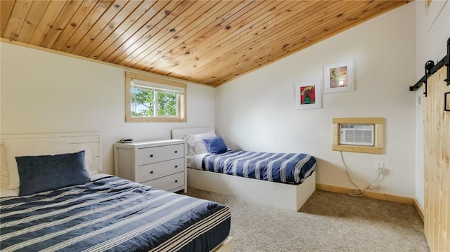 10787 Reynolds Rd, Hayward, WI 54843 - bedroom featuring wooden ceiling, a barn door, carpet floors, lofted ceiling, and baseboards