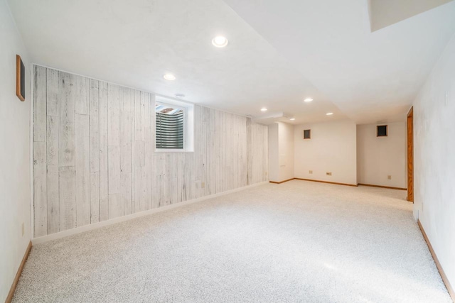 1603 Maplewood Dr, Little Chute, WI 54140 - basement featuring carpet flooring, recessed lighting, baseboards, and wooden walls