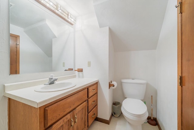1603 Maplewood Dr, Little Chute, WI 54140 - half bathroom with vanity, toilet, vaulted ceiling, and baseboards