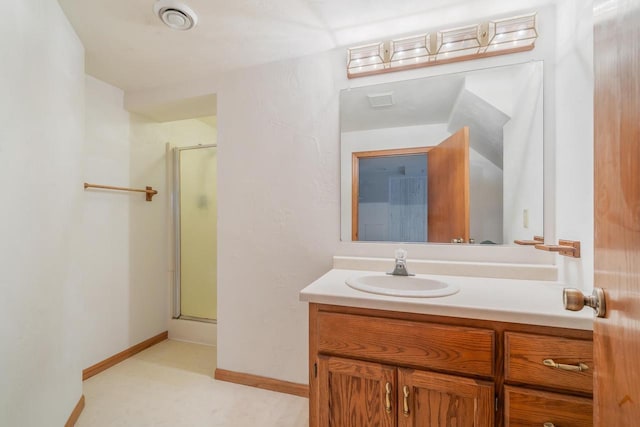 1603 Maplewood Dr, Little Chute, WI 54140 - bathroom with vanity, an enclosed shower, and baseboards