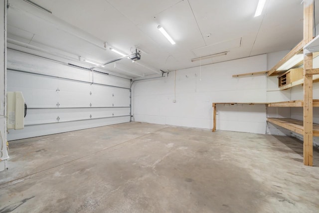 1603 Maplewood Dr, Little Chute, WI 54140 - garage featuring a garage door opener