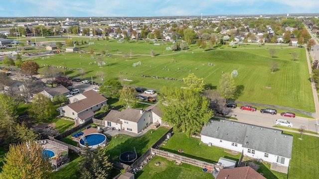 1603 Maplewood Dr, Little Chute, WI 54140 - aerial view of property and surrounding area featuring nearby suburban area and a pool area