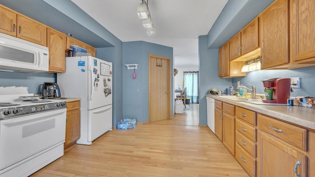 286 Ledgeview Ave, Fond Du Lac, WI 54935 - kitchen with white appliances, a sink, light wood-type flooring, and light countertops