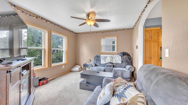 286 Ledgeview Ave, Fond Du Lac, WI 54935 - carpeted living area featuring ceiling fan, baseboards, and a textured wall