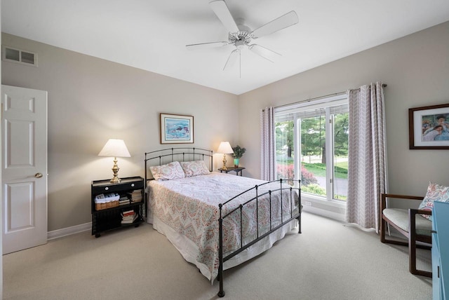 1261 Deer Ct, Lake Geneva, WI 53147 - bedroom featuring light carpet, baseboards, and ceiling fan