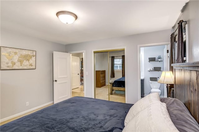 2706 Nimitz St, Eau Claire, WI 54701 - bedroom with a closet, baseboards, and connected bathroom