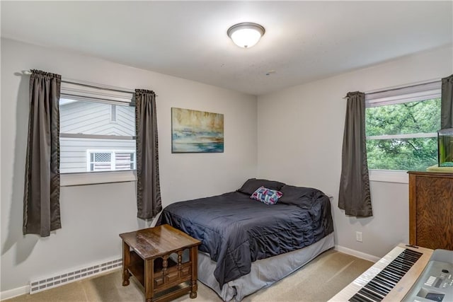 2706 Nimitz St, Eau Claire, WI 54701 - carpeted bedroom with baseboard heating and baseboards