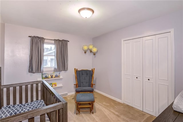 2706 Nimitz St, Eau Claire, WI 54701 - bedroom with light carpet, a closet, and baseboards
