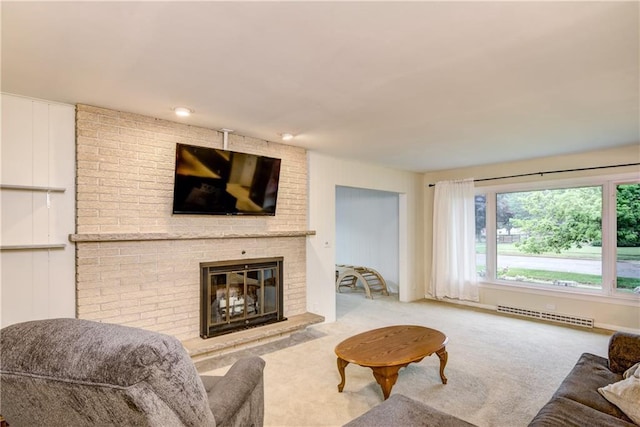 2706 Nimitz St, Eau Claire, WI 54701 - carpeted living room featuring a baseboard heating unit and a fireplace