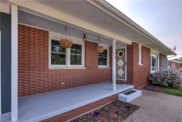 2706 Nimitz St, Eau Claire, WI 54701 - view of exterior entry featuring brick siding