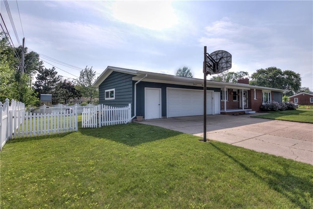 2706 Nimitz St, Eau Claire, WI 54701 - ranch-style home featuring a garage, concrete driveway, and a chimney