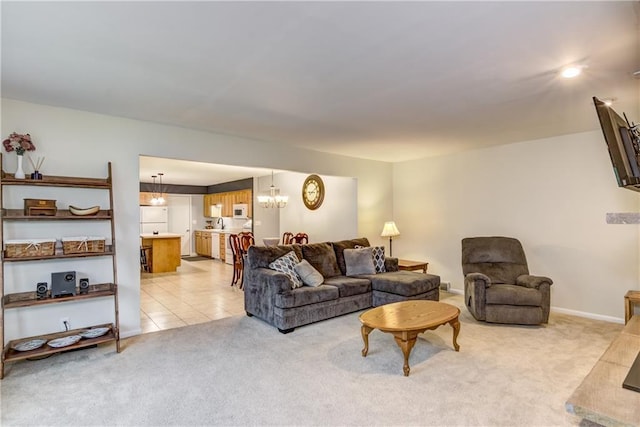2706 Nimitz St, Eau Claire, WI 54701 - living area with light carpet, a chandelier, baseboards, and light tile patterned floors
