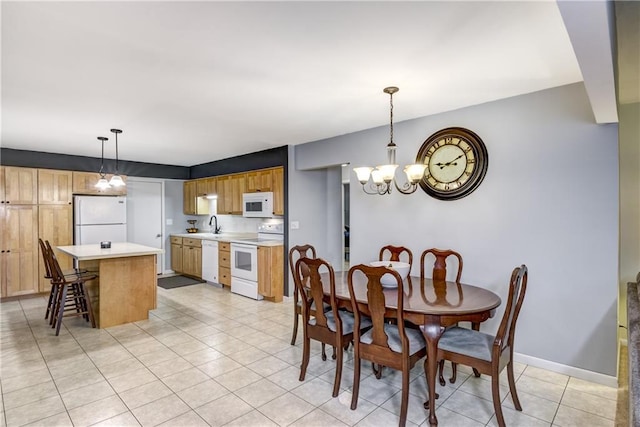 2706 Nimitz St, Eau Claire, WI 54701 - dining room featuring a chandelier and light tile patterned floors