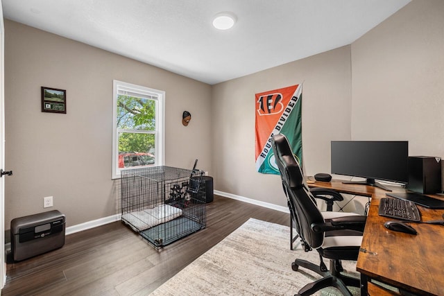 1514 S 96th St, West Allis, WI 53214 - home office featuring baseboards and dark wood-style flooring