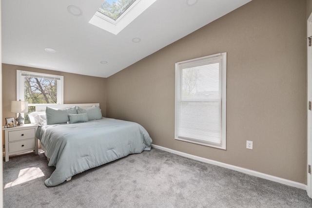 1514 S 96th St, West Allis, WI 53214 - carpeted bedroom with lofted ceiling, a skylight, and baseboards