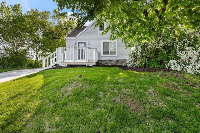 1514 S 96th St, West Allis, WI 53214 - view of front facade with a wooden deck and a front yard