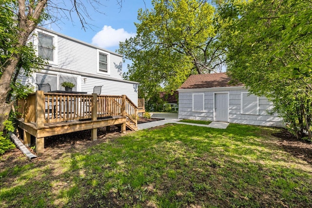 1514 S 96th St, West Allis, WI 53214 - view of grassy yard featuring a wooden deck and an outdoor structure