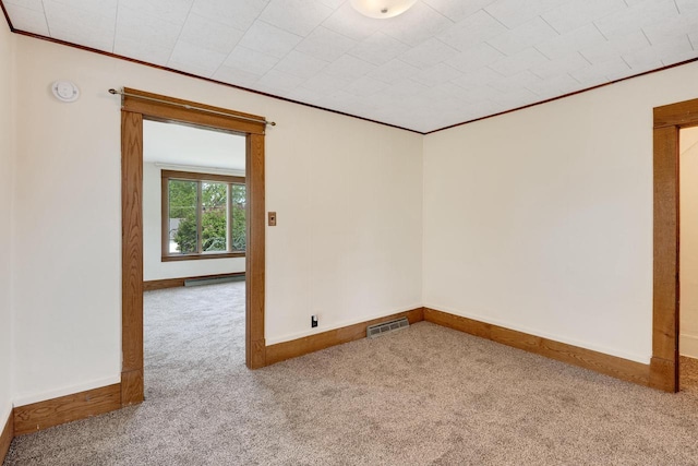 103 First St, Ontario, WI 54651 - carpeted empty room featuring crown molding, a smoke detector, and baseboards