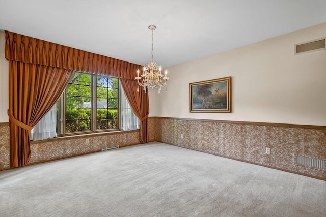 15075 Kings Ridge Ct, Brookfield, WI 53005 - carpeted empty room with wainscoting, a chandelier, and wallpapered walls