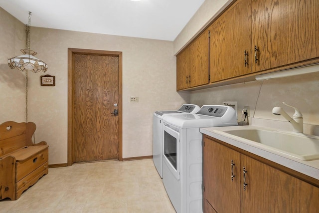 15075 Kings Ridge Ct, Brookfield, WI 53005 - laundry area with cabinet space, independent washer and dryer, and baseboards