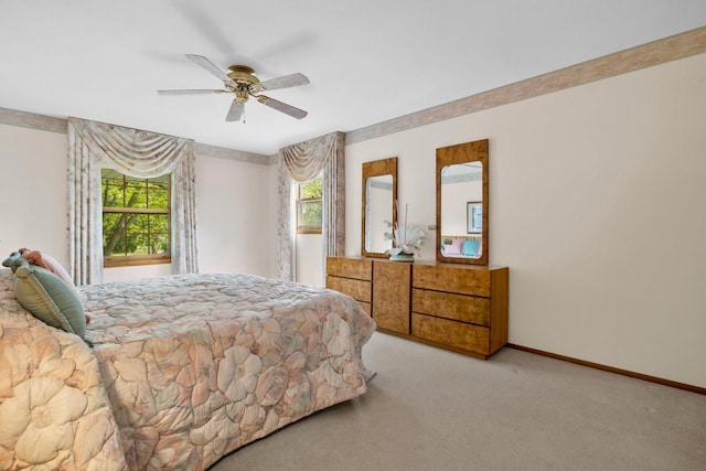 15075 Kings Ridge Ct, Brookfield, WI 53005 - bedroom with multiple windows, light colored carpet, baseboards, and a ceiling fan