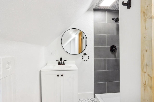 2533 S Austin St, Milwaukee, WI 53207 - full bath with vanity, a tile shower, and vaulted ceiling