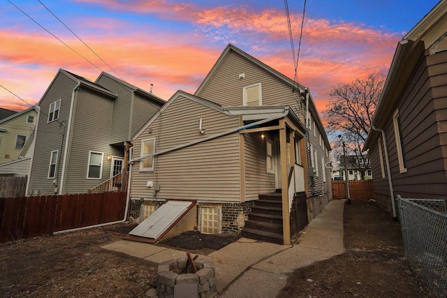 2533 S Austin St, Milwaukee, WI 53207 - back of property at dusk with a fenced backyard