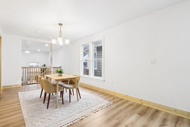 2533 S Austin St, Milwaukee, WI 53207 - dining space featuring baseboards, light wood-style floors, a chandelier, and recessed lighting