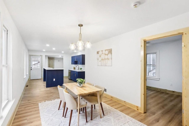 2533 S Austin St, Milwaukee, WI 53207 - dining room featuring baseboards, light wood-style floors, a chandelier, and recessed lighting