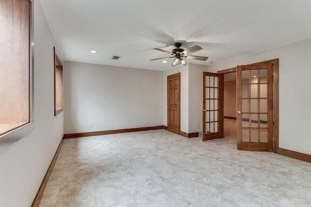 3104 Macharley Ln, La Crosse, WI 54601 - spare room featuring french doors, a ceiling fan, baseboards, and recessed lighting