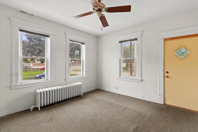 3700 E Hammond Ave, Cudahy, WI 53110 - unfurnished room with radiator, carpet flooring, ceiling fan, and baseboards