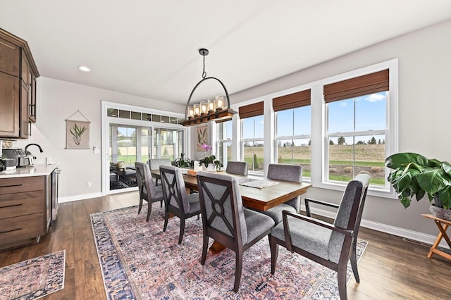 N56W27213 Crispin Ct, Lisbon, WI 53089 - dining room with baseboards, dark wood-style flooring, and recessed lighting