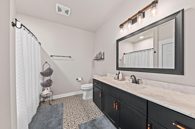 N56W27213 Crispin Ct, Lisbon, WI 53089 - full bathroom with vanity, baseboards, toilet, and a shower with curtain
