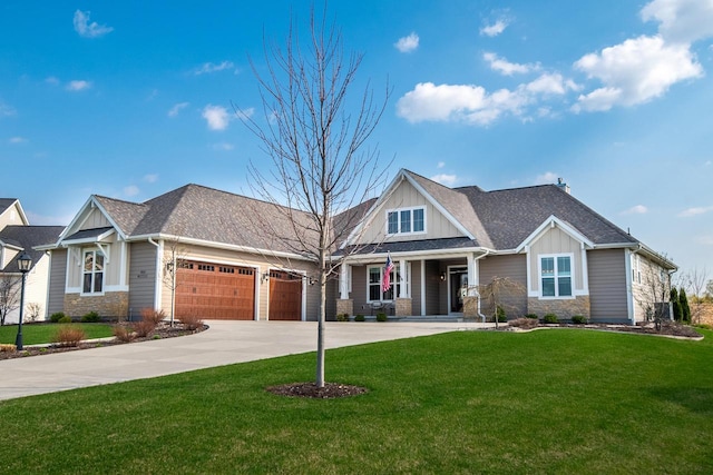 N56W27213 Crispin Ct, Lisbon, WI 53089 - craftsman-style home featuring board and batten siding, a garage, driveway, and stone siding