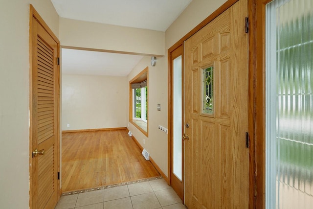 3573 S 94th St, Milwaukee, WI 53228 - foyer with light tile patterned flooring and baseboards