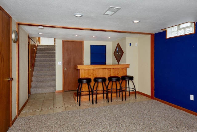 3573 S 94th St, Milwaukee, WI 53228 - indoor dry bar featuring stairs, recessed lighting, a textured ceiling, carpet floors, and baseboards