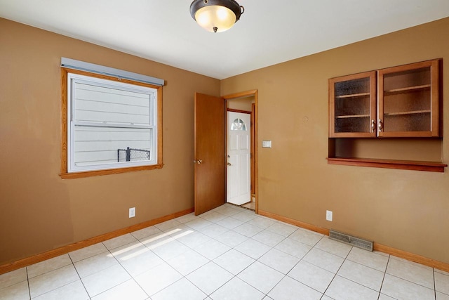 3573 S 94th St, Milwaukee, WI 53228 - spare room with baseboards and light tile patterned floors