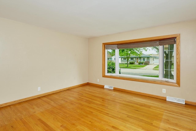 3573 S 94th St, Milwaukee, WI 53228 - unfurnished room featuring light wood-style flooring and baseboards