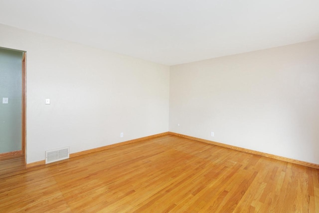 3573 S 94th St, Milwaukee, WI 53228 - spare room featuring light wood-style floors and baseboards